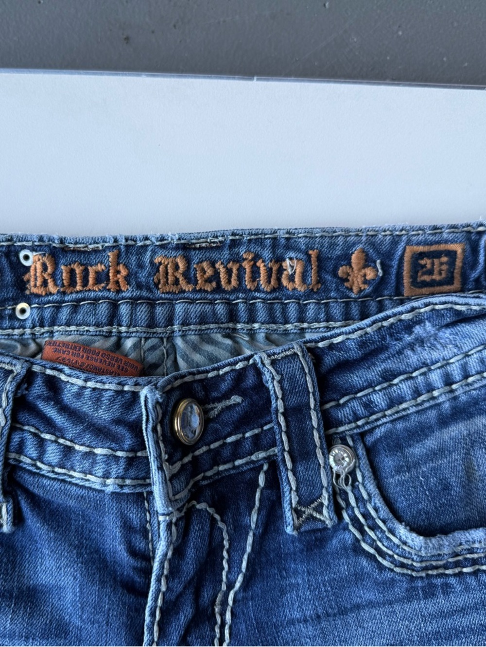 Rock Revival Dark Blue Jeans with Orange Embroidered Waistband